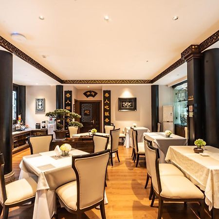 Buddha Zen Hotel Чънду Екстериор снимка